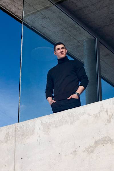 Franjo von Allmen in casual clothing during a photo shoot in Zinal, Switzerland in April 2025.