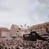 An MTB rider performs in front of spectators at Red Bull District Ride 2022 in Nuremberg, Germany