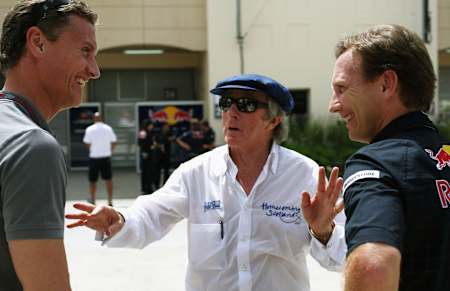 Sir Jackie Stewart chats to David Coulthard and Christian Horner at the 2009 Bahrain F1 Grand Prix.