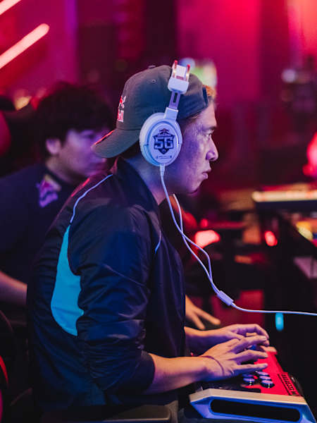 In 2022, Daigo 'The Beast' Umehara and Masato 'Bonchan' Takahashi compete at the Red Bull 5G Finals in Fukuoka, Japan.