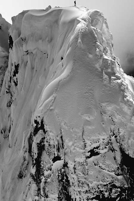 Leclerc atop the famed Northeast Buttress of Mount Slesse in British Columbia.