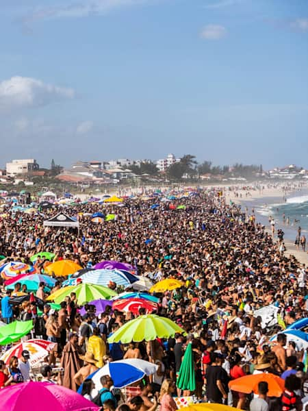 A packed beach at Barrinha, Saquarema, readies themselves for the surfing to get underway.