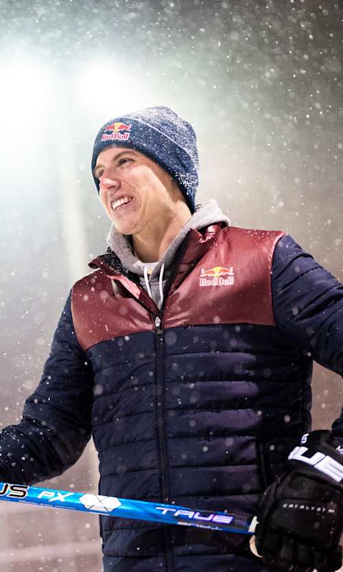 Mitch Marner on an outdoor rink at night during a snowstorm 
