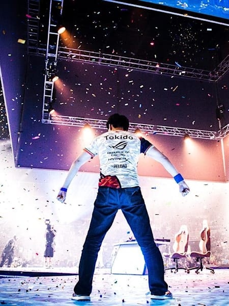 Hajime ‘Tokido’ Taniguchi poses in Akuma’s Raging Demon after he takes EVO 2017.