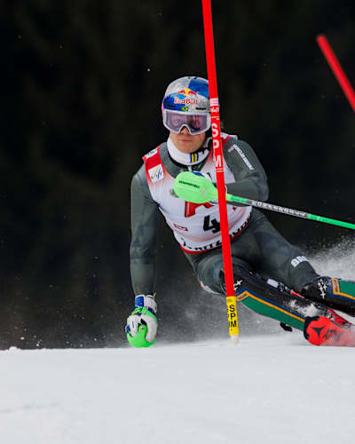 Lucas Pinheiro Braathen of Brazil carves through the gates at the 2026 Hahnenkamm Race in Kitzbühel, Austria. 