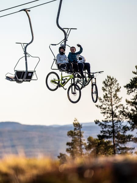 Attach your bike to the lift and off you go.