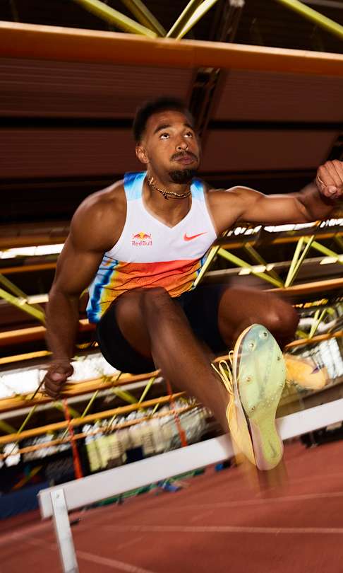 Leo Neugebauer in the 110 metre hurdles sprint. 