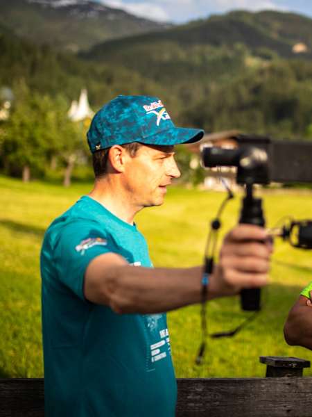 Race reporter Tarquin Cooper with athlete Aaron Durogati (ITA1)
