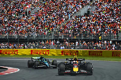 Yuki Tsunoda leads Lance Stroll on track during the F1 Grand Prix of Canada at Circuit Gilles-Villeneuve on June 15, 2025 in Montreal, Quebec.