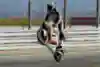 Raul Fernandez pulling a wheelie after the race in Aragon 2016