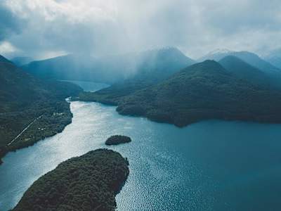 Views over forested mountains and lakes in Patagonia.