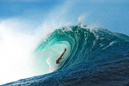 Mark Cunningham bodysurfs a wave at Teahupo'o