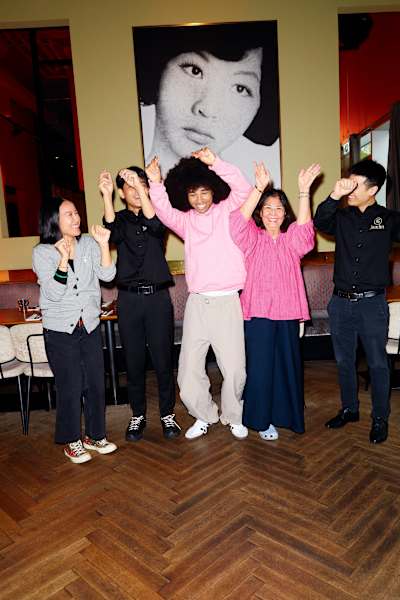 Noel Robinson dancing with others. 