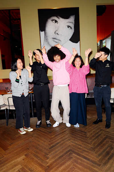 Noel Robinson dancing with others. 