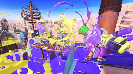 Screenshot aus Splatoon 3 zeigt eine Figur, in einer bunten Karte voller lilaner und gelber Tinte 