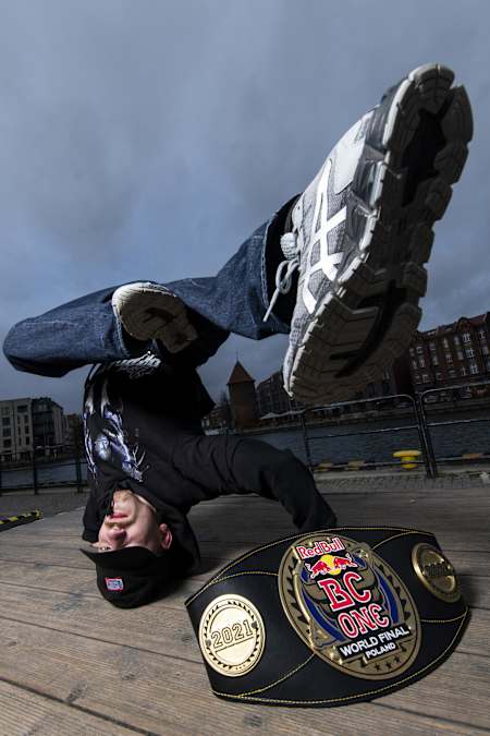 B-boy Amir of Kazakhstan poses for a portrait with the Red Bull BC One World Final winner belt in Gdansk, Poland on November 7, 2021.