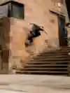 Eddie Belvedere skating the streets in front of Jake Wooten in Manchester, UK on May 18, 2022.