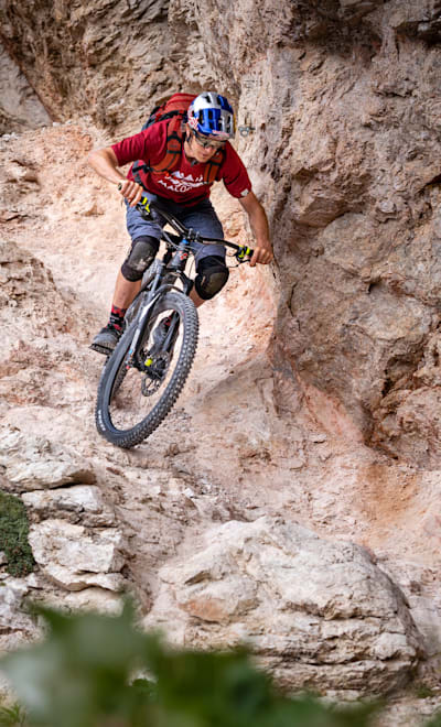 Tom Oehler rides his mountain bike in Canazei, Italy on August 27, 2020.