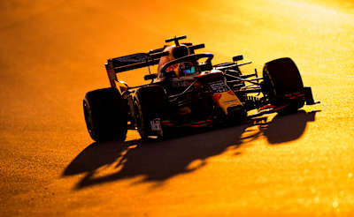 Alex Drives The RB16 During Sunset In Barcelona