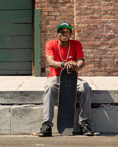 Kareem Campbell sits with his board in LA.