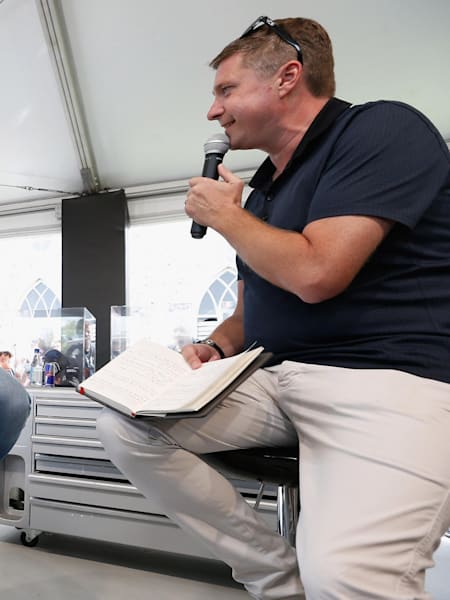 A photo of F1 commentator David Croft interviewing Red Bull Racing's Christian Horner at Goodwood.