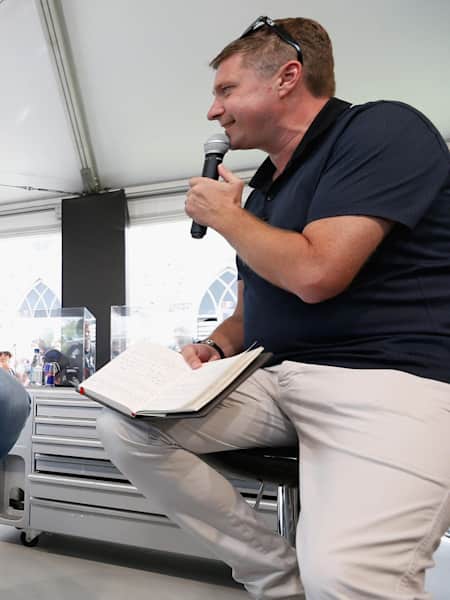 A photo of F1 commentator David Croft interviewing Red Bull Racing's Christian Horner at Goodwood.