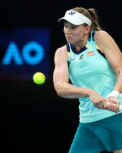 Elena Rybakina of Kazakhstan plays a backhand in their round one singles match against Karolina Pliskova of the Czech Republic during the 2024 Australian Open at Melbourne Park on January 16, 2024.