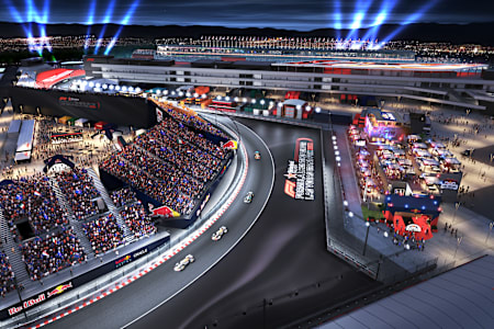 A night-time aerial view of Red Bull Energy Station Las Vegas & Oracle Red Bull Racing Fan Grandstands.