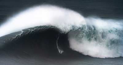 Kai Lenny surfs big waves in Nazaré, Portugal on February 11, 2020.