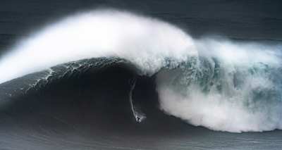 Kai Lenny surfs big waves in Nazaré, Portugal on February 11, 2020.