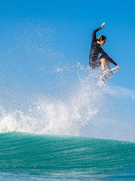 Jordy Smith performs and aerial while surfing at Duranbah Beach on the Gold Coast of Australia.