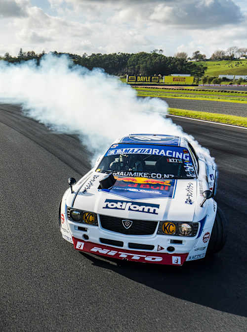 'Mad' Mike Whiddett performs in his MADBUL RX7 at Hampton Downs race track, Waikato, New Zealand on May 09, 2018 