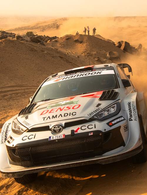On November 27, 2025, Sébastien Ogier and Toyota Gazoo Racing WRT carve through Jeddah’s desert at World Rally Championship stop 14, with Red Bull’s high-adrenaline spirit