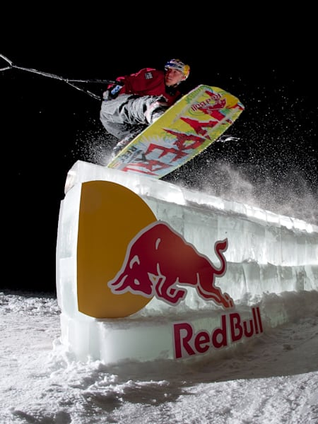 JD Webb wakeboards an ice rail in Minnesota, USA in a photograph shot by Ryan Taylor.