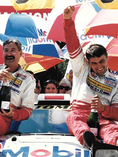 Maciej Wisławski and Krzysztof Hołowczyc celebrate their 1996 victory