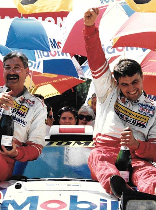 Maciej Wisławski and Krzysztof Hołowczyc celebrate their 1996 victory