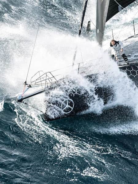 Alex Thompson in the Hugo Boss boat hits a big wave during the Vendee Globe solo round the world sailing race