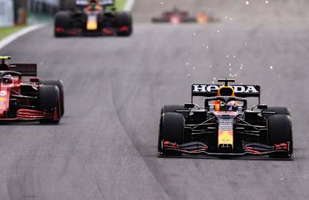 Max Verstappen drives ahead of Carlos Sainz in Ferrari at the 2021 Brazilian F1 Grand Prix