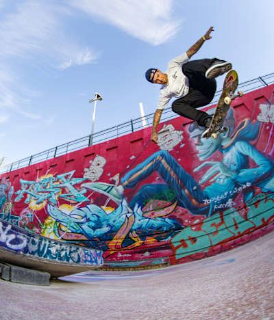 Ryan Sheckler performs a backside kickflip at Red Bull Drop In Tour.