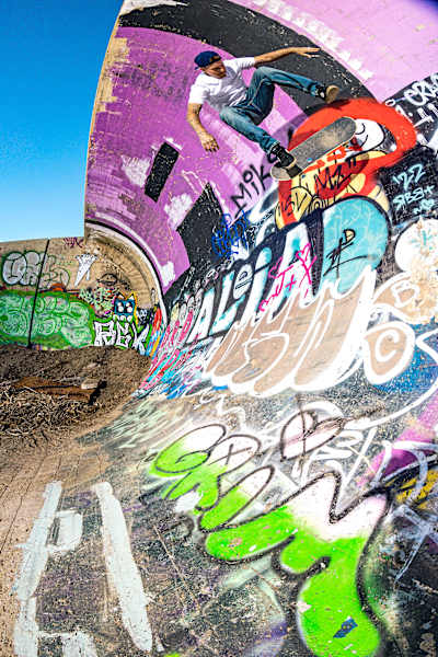 Ryan Sheckler doing a backside kickflip in Denver's Hook.
