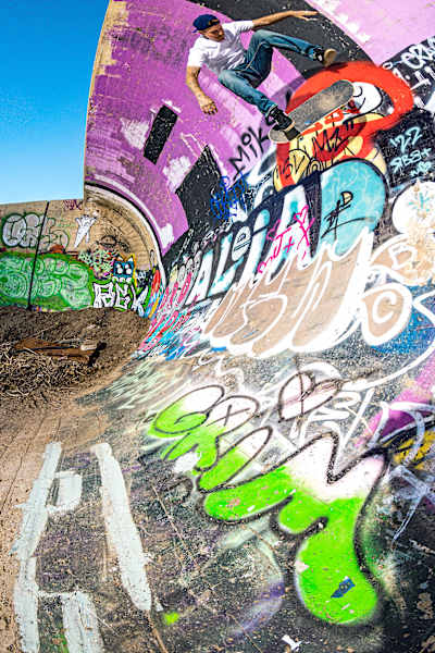 Ryan Sheckler doing a backside kickflip in Denver's Hook.