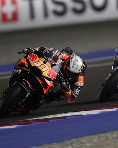 Red Bull KTM Factory Racing's Pedro Acosta leans into a high-speed turn during Stop 4 of the 2025 MotoGP World Championship at Losail International Circuit, Qatar