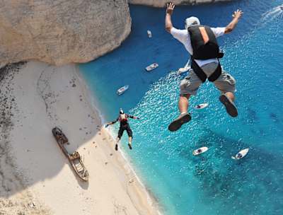 Hubert Schober and Kedley Oliveti BASE-jump onto a beach on Zakynthos in Greece.