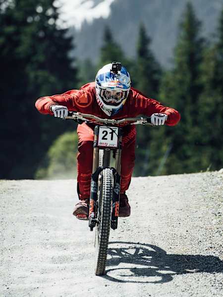 Gee Atherton performs during Leogang DH race