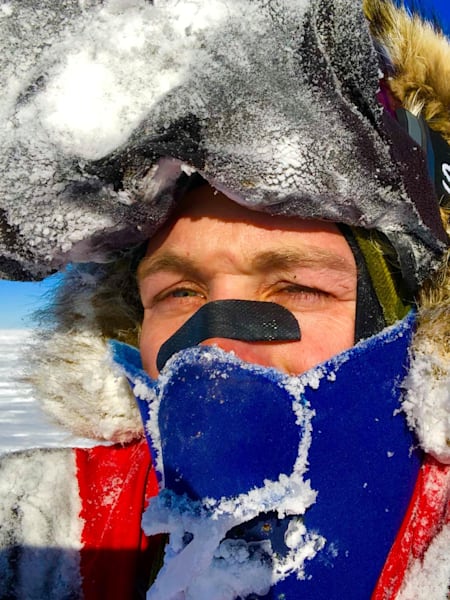 The American needed to cover his facial features to avoid frostbite