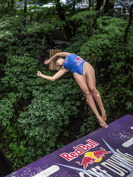 Rhiannan Iffland of Australia dives from the 21 meter platform during the final competition day of the fourth stop of the Red Bull Cliff Diving World Series in Takachiho, Japan on August 3, 2023. 