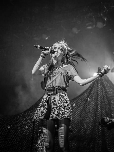 A photo of Canadian electronic pop artist Grimes performing at The Mayan Theatre, in Los Angeles, in 2015.