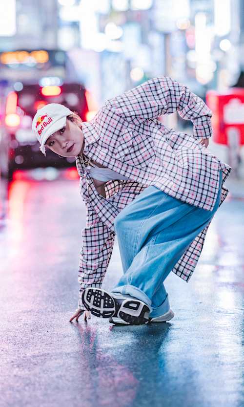 B-Girl Ami on the streets of Shibuya ahead of the Red Bull BC One World Final 2025 announcement in Tokyo, captured on December 8, 2024