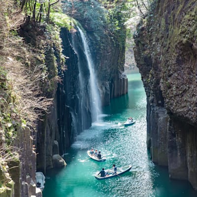 The flowing waters beneath the Takachiho Gorge in Takachiho, Japan.