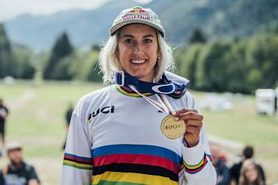 Myriam Nicole poses for a winner's portrait at UCI DH World Championships in Val di Sole, Italy on August 29, 2021.